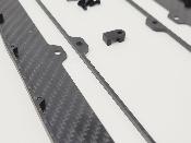 Bavettes de protection de châssis Carbone Usinées pour carrosserie large de EB48 2.X LR PROD