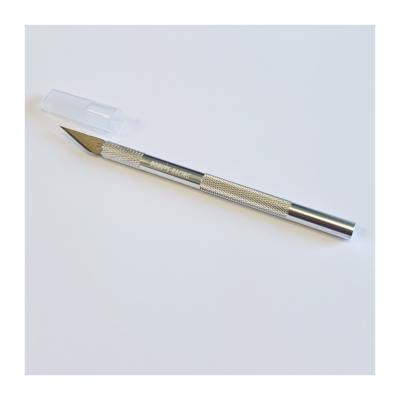 Cutter de précision aluminium Silver avec lame DONUTS RACING